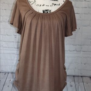 Blouse with side gathers.